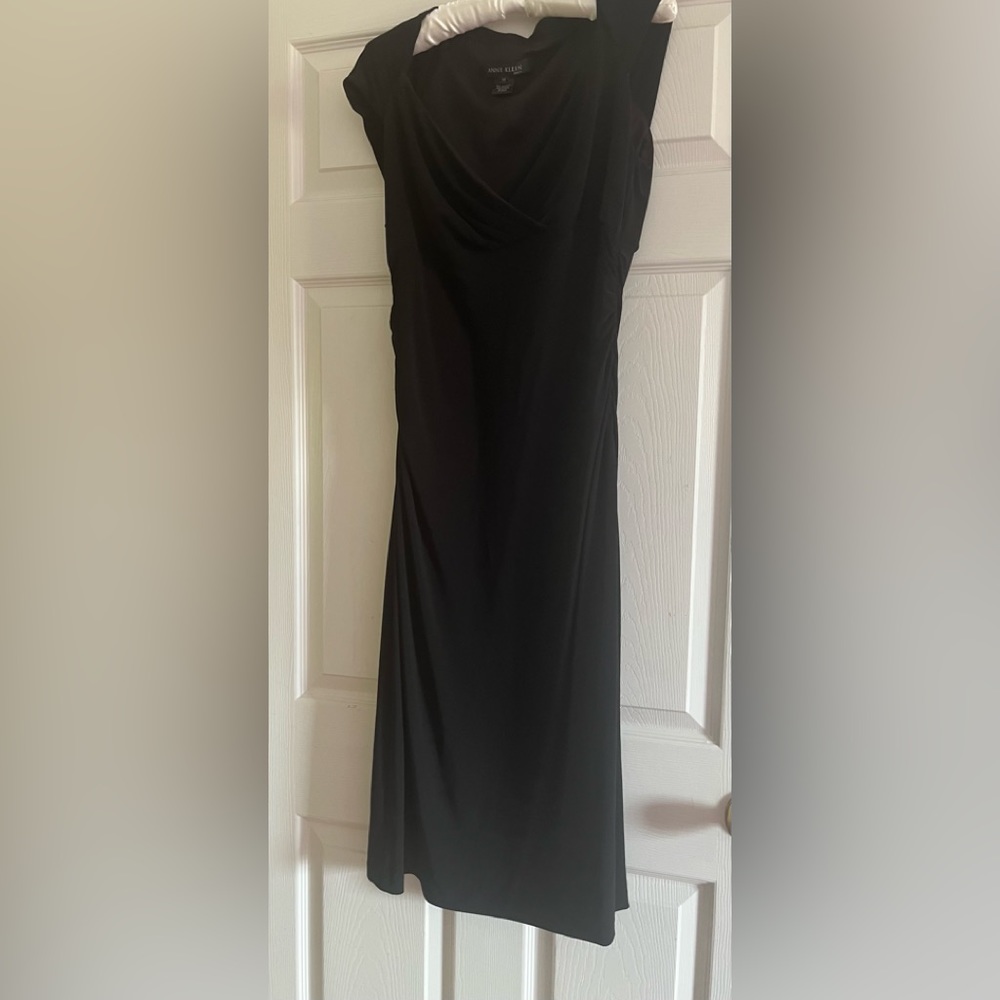 Anne Klein black cap sleeve cocktail dress.  Sweetheart neckline, side ruch.